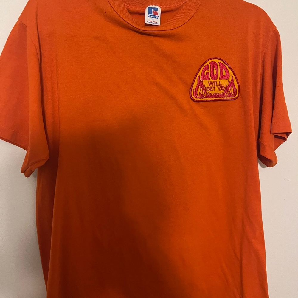 Vintage orange Russel Tshirt with the vintage patch sewn on left chest.